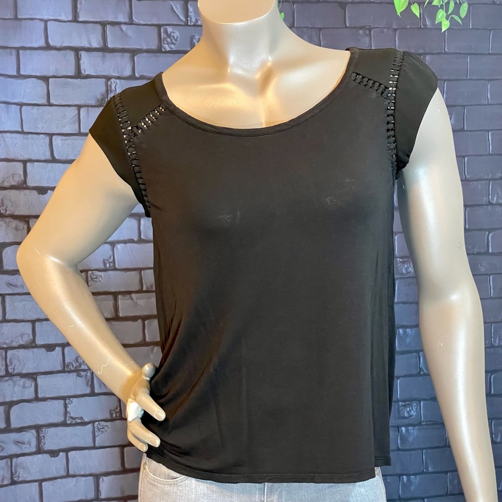 Loft black, rayon top with open/eyelet details around chest and back